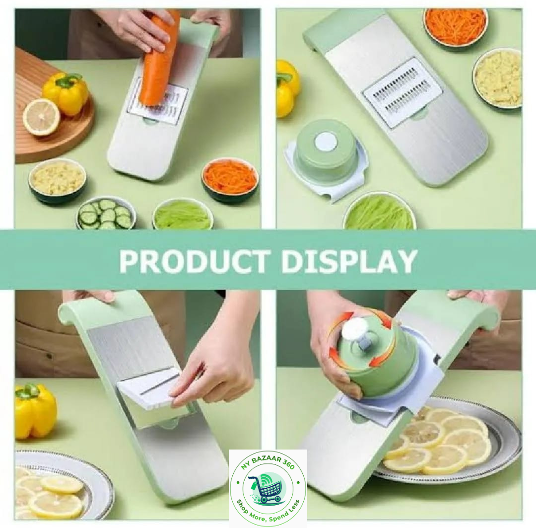 Multifunctional kitchen tool being used to slice vegetables and fruits on a green table.